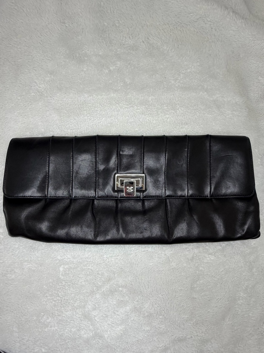 CHANEL Black Quilted Leather Clutch with Silver Turn Lock